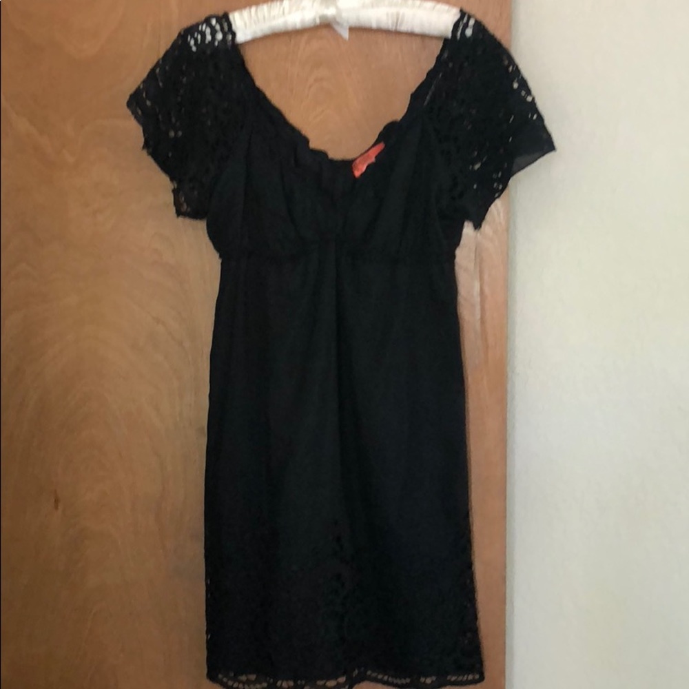 Lacy sleeved cocktail dress